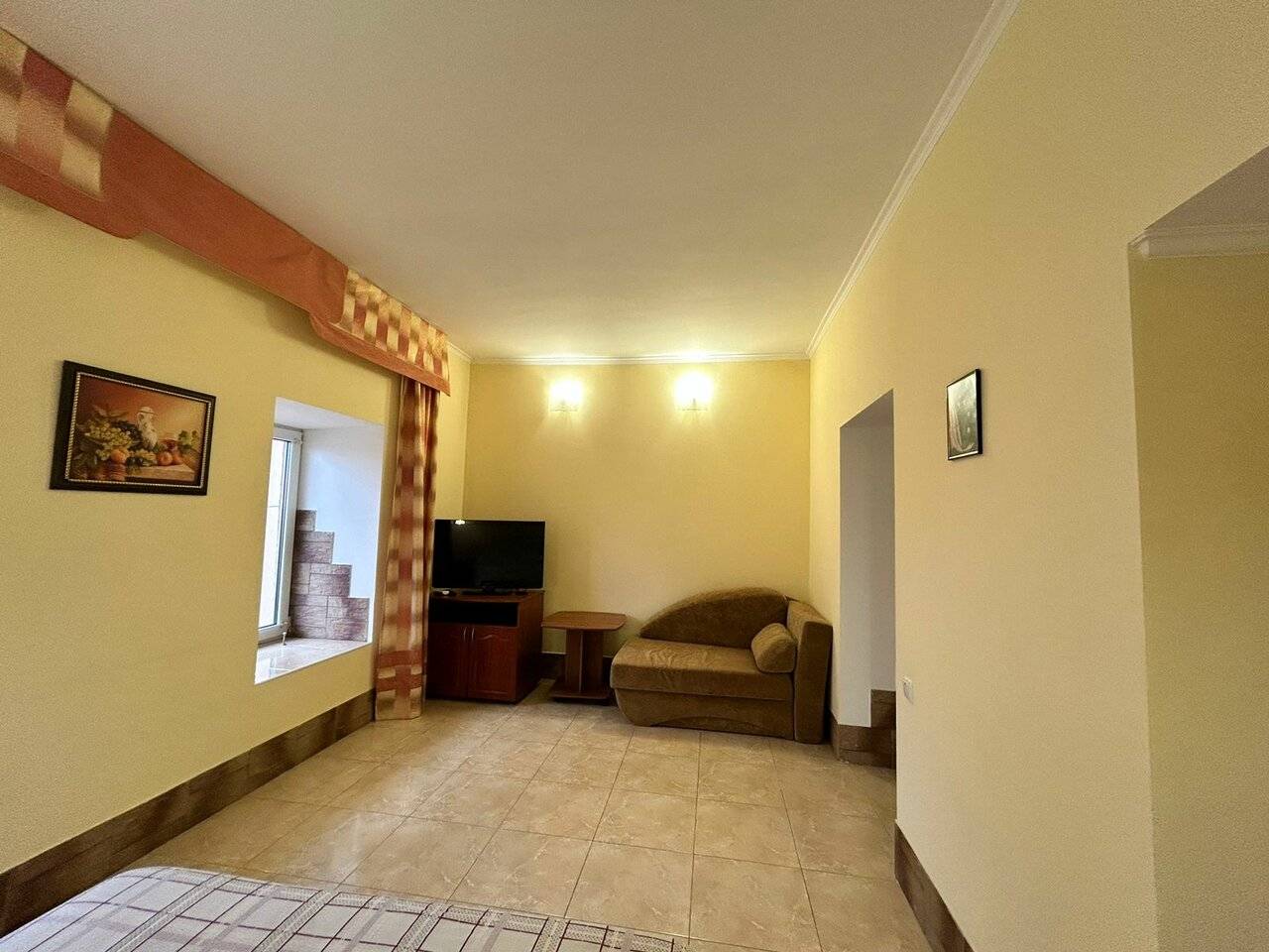 Фотографии номера Четырехместный номер в Гостевом доме Усадьба у графского парка Алупка